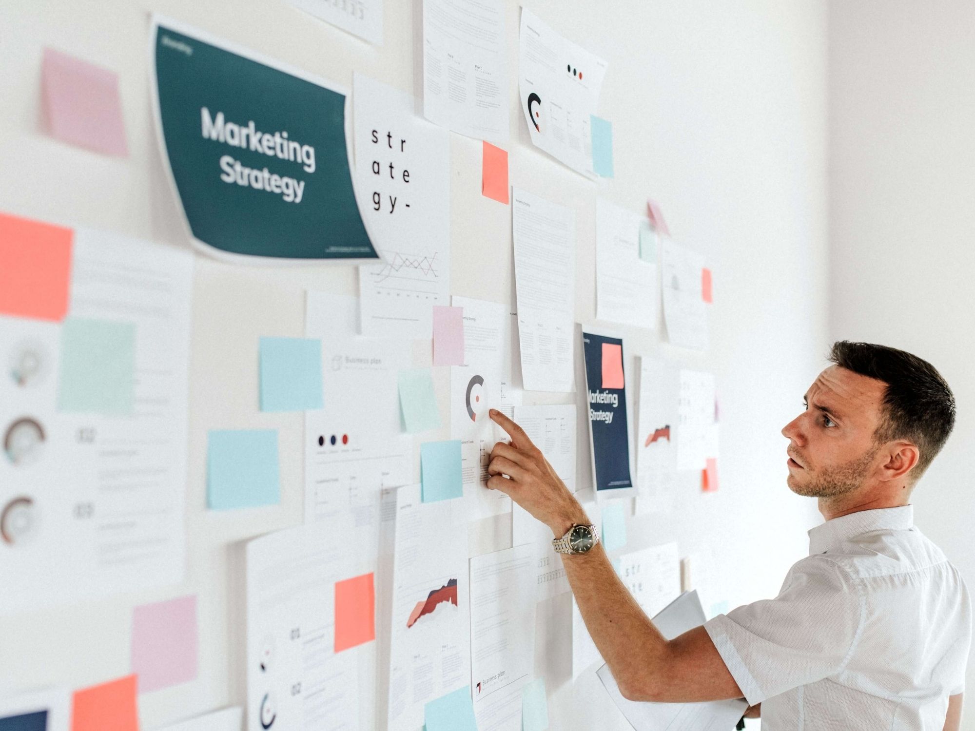 a-casual-business-man-checking-a-marketing-plan